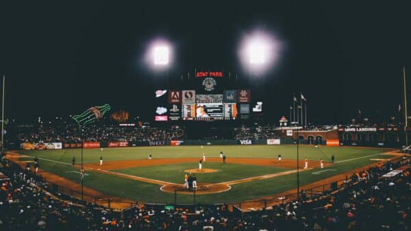 baseball player on baseball field during nighttime